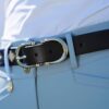 La Regalia Polo Belt in dark chocolate leather with Argentine blue stitching and signature silver stirrup buckle, equestrian accessories