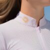 La Regalia Lucero Baselayer with perforated upper panels, ¾ zip neckline, built-in sun protection and signature Argentinian sun embroidery on the collar