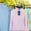 La Regalia Lucero Baselayer with perforated upper panels, ¾ zip neckline, built-in sun protection and signature Argentinian sun embroidery on the collar