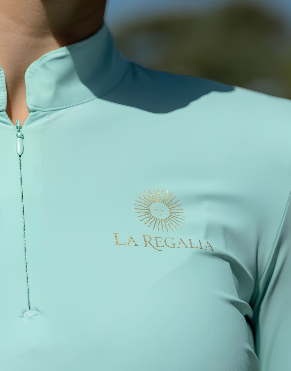 La Regalia Solana Baselayer with signature Argentinian half sun design on the back, cuffed sleeves and built-in sun protection, lightweight equestrian baselayer