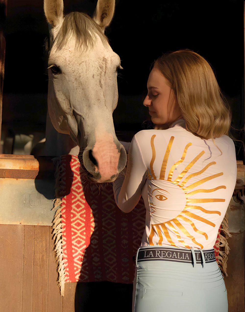 La Regalia Solana Baselayer with signature Argentinian half sun design on the back, cuffed sleeves and built-in sun protection, lightweight equestrian baselayer