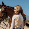 La Regalia Solana Baselayer with signature Argentinian half sun design on the back, cuffed sleeves and built-in sun protection, lightweight equestrian baselayer