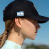 La Regalia Sun Cap with structured curved brim, signature Argentinian sun embroidery and adjustable strap, premium equestrian lifestyle cap