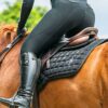 Diamond Dust Numnah in black with subtle shimmer finish, premium quilted construction and high wither cut, elegant equestrian saddle pad for training and competition