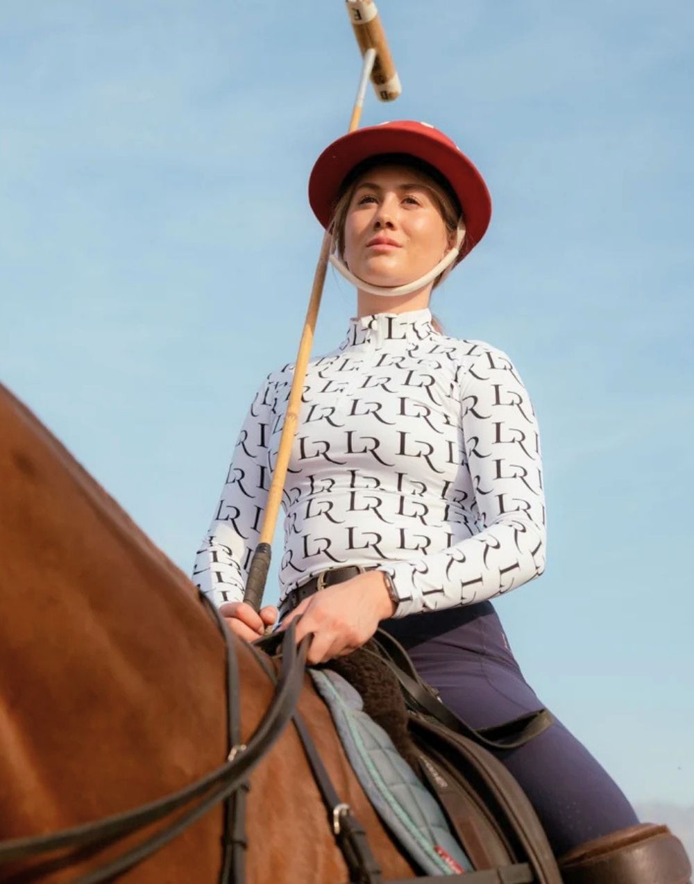 La Regalia Malena Baselayer lightweight breathable with structured panels and ¾ zip neckline