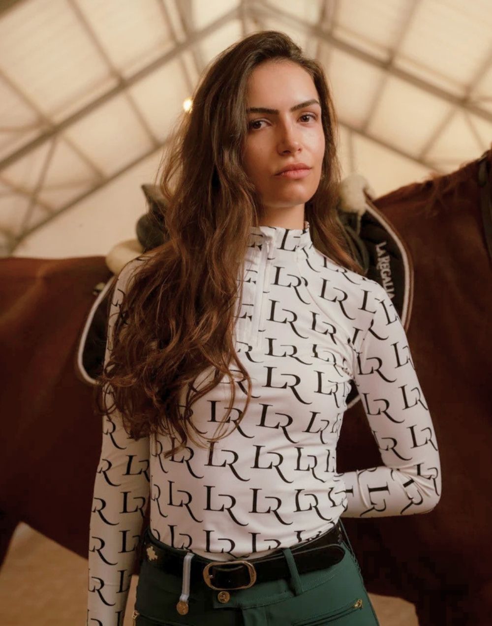 La Regalia Malena Baselayer lightweight breathable with structured panels and ¾ zip neckline
