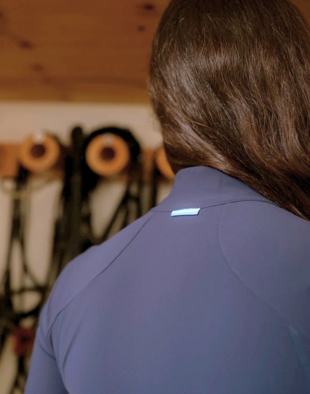La Regalia Malena Baselayer lightweight breathable with structured panels and ¾ zip neckline